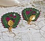 Boucles d'oreilles artisanales en perles vertes et roses.