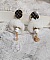 BO Cassandre avec des pierres de gemme : le Howlite Blanc &agrave; laquelle s&rsquo;ajoute des pompons, des intercalaires rondelles, des coupelles feuilles et breloques. Mont&eacute;s sur des puces Noires et Dor&eacute;es 