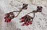 BO Irr&eacute;sistible Rubis mont&eacute;es sur des chandeliers avec des cristaux de Swarovski