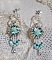BO Blue Flowers brod&eacute;es avec des cabochons en forme de rose R&eacute;sine, toupies Jet AB2X, perles rondes nacr&eacute;es, navettes et cha&icirc;ne en Cristal. Le tout est orn&eacute; de rocailles et farfalles