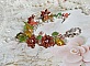 Bracelet gourmette orné de fleurs, feuilles et jade orange.