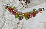 Bracelet gourmette argenté avec fleurs et jade orange.