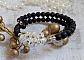 Bracelet Couronne Noire avec pierres de lave, pendentifs cristal de Swarovski et perles tubes m&eacute;tal