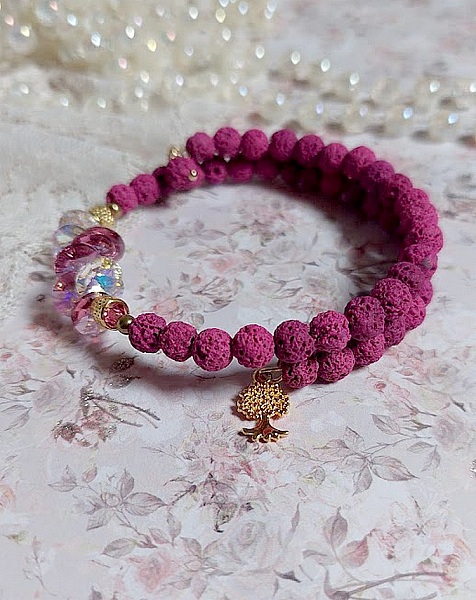 Bracelet bohème chic en pierres de lave rose framboise.