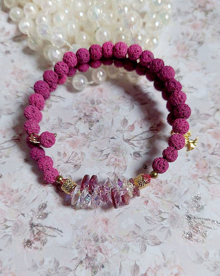 Bracelet bohème chic en pierre de lave rose et cristal.