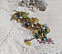 Bracelet Cézanne fleuri avec perles colorées et fermoir mousqueton.