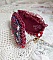 Bracelet manchette brodé de perles rouges et dentelle élégante.