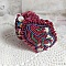 Bracelet manchette brodé de perles aux couleurs automnales.