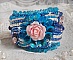 Bracelet Belle Epoque Haute Couture brod&eacute; avec des navettes en Cristal de Swarovski &agrave; laquelle s'ajoute des chatons, toupies, rose en r&eacute;sine, perles rondes nacr&eacute;es, briolettes et rocailles