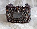 Bracelet manchette artisanal en jaspe Picasso et perles brodées.