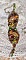 Bracelet artisanal brodé en soie et perles aux tons chauds.