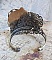 Bracelet L'&eacute;l&eacute;gante du Temps cr&eacute;e avec des rouages, estampes, vis, boulons, m&eacute;canisme de montres et d'autres mat&eacute;riaux