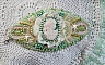 Bracelet manchette Anisse haute-Couture brod&eacute; avec un cabochon portrait de femme cr&eacute;e par mes soins, des perles de Swarovski, des rocailles.