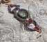 Bracelet Cheyenne manchette brod&eacute; avec une pierre de gemme, un rubis Fuchsite avec des rocailles Miyuki et des rocailles tch&egrave;ques.
