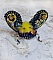 Broche papillon brodée bleu marine et jaune, perles et cristaux.