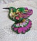 Broche colibri brodée de sequins et perles colorées.