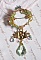 Broche Garden Party brod&eacute;e avec des cristaux de Swarovski, un cabochon vert Olivine en verre de boh&egrave;me des ann&eacute;es 1960 et des rocailles