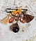 Broche épingle fantaisie avec strass, pompons et perles verre.