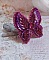 Broche papillon brodée en soie, sequins et perles fuchsia.