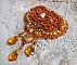 Broche Rumba brod&eacute;e avec des cristaux de Swarovski, des strass, des navettes Tangerine, des perles rondes et des rocailles