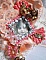 Broche Rustic Rose cr&eacute;e avec un cabochon repr&eacute;sentant une jeune fille souriante, de la dentelle Orange strass&eacute; et Rose, des cristaux, des perles en verre et des accessoires divers