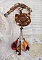 Collier Amber Romance avec un cabochon jaspe Picasso orn&eacute; de rocailles en verre, toupies de diff&eacute;rentes couleurs en cristal, perles de gemme Citrine, Agate et Jaspe Picasso. Mont&eacute;s sur du cuir