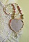Collier Coeur Tendre brod&eacute; avec un ruban de soie Rose et Jaune, des perles en c&eacute;ramique, des Cristaux de Swarovski et des rocailles