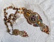 Collier artisanal unique en pierres naturelles, perles et cristaux.