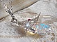 L'éclat intemporel du cristal Swarovski épouse la poésie d'une fleur d'argent