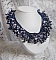 Collier Fleur de corail mont&eacute; avec des pierres de gemme : le Lapis Lazuli, le Quartz et le Sodalite. J&rsquo;ai mis en forme ce collier aux dentelles de rocailles Roses et Jet AB pour un monde de coraux 