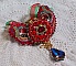 Collier Mia Haute Couture brod&eacute; avec des cabochons en Cristal couleur Rouge et octogone en verre ann&eacute;e 1960, perles en Plaqu&eacute; Or, rubans organza Rouge et Vert, breloques, toupie, goutte et rocailles