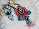 Plastron Na&iuml;ade plastron Haute-Couture cr&eacute;e avec des cabochons turquoise Hubei et perles en Corail &agrave; laquelle s'ajoute des cristaux, gouttes en Verre de boh&egrave;me, rocailles, dentelle avec fermoirs 