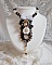 Collier Noir Sacr&eacute; Haute Couture brod&eacute; avec des cristaux : navette, cabochon, perles rondes aplaties, toupies aux couleurs Cristal et Jet, rondelles, perles rondes Verre, rubans, organza et dentelle
