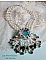 Plastron Oc&eacute;ane brod&eacute; avec un cabochon poire Aquamarine &agrave; laquelle s'ajoute des perles nacr&eacute;es, cristaux, Argent 925, cuir, perles rondes lisses et rocailles aux couleurs de la mer, un style marin