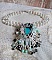 Plastron Oc&eacute;ane brod&eacute; avec un cabochon poire Aquamarine &agrave; laquelle s'ajoute des perles nacr&eacute;es, cristaux, Argent 925, cuir, perles rondes lisses et rocailles aux couleurs de la mer, un style marin