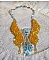 Plastron Papillon de Versailles Haute Couture brod&eacute; avec c&oelig;urs et cabochons en cristal de Swarovski aux couleurs Jaune d&rsquo;Or, Bleu et Argent. S&rsquo;ajoute des rocailles pour un style Art Nouveau !