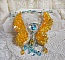Plastron Papillon de Versailles Haute Couture brod&eacute; avec c&oelig;urs et cabochons en cristal de Swarovski aux couleurs Jaune d&rsquo;Or, Bleu et Argent. S&rsquo;ajoute des rocailles pour un style Art Nouveau !