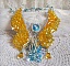 Plastron Papillon de Versailles Haute Couture brod&eacute; avec c&oelig;urs et cabochons en cristal de Swarovski aux couleurs Jaune d&rsquo;Or, Bleu et Argent. S&rsquo;ajoute des rocailles pour un style Art Nouveau !