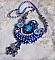 Collier artisanal bleu brodé de cristaux Swarovski et perles.