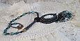 Pendentif Angelot avec un cabochon Ange brod&eacute; de perles rondes nacr&eacute;es Cristal avec des rocailles. S&rsquo;ajoute des facettes, toupies, perles ovales Lampwok serti d&rsquo;un ruban Dor&eacute; et palets