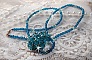 Pendentif Emeraude avec des toupies en cristal de Swarovski et des facettes
