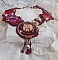 Plastron Art'D Haute-Couture brod&eacute; avec des rocailles de diff&eacute;rentes couleurs et des perles nacr&eacute;es en cristal de Swarovski