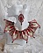 Collier Romane plastron mont&eacute; avec une abondance de rocailles aux couleurs : Bordeaux, Ivoire et Rouge &agrave; laquelle s'ajoute des gouttes plates, perles en bois, perles en laiton pour un style Ethnique