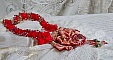 Collier plastron Secret Oriental brod&eacute; avec un cabochon en verre tr&egrave;s ancien et des toupies en cristal de Swarovski