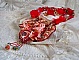 Collier plastron Secret Oriental brod&eacute; avec un cabochon en verre tr&egrave;s ancien et des toupies en cristal de Swarovski