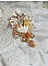 Pendentif Aurore mont&eacute; avec un motif &eacute;maill&eacute; aux couleurs du soleil &agrave; laquelle s&rsquo;ajoute perles nacr&eacute;es, breloques, poires avec Zircons, perles, ruban sur une b&eacute;li&egrave;re Argent 925 et une cha&icirc;ne plaqu&eacute; Or
