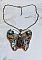 Pendentif papillon brodé de sequins, perles et cristaux Swarovski.