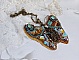 Pendentif papillon brodé en sequins, perles et strass Swarovski.