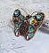 Pendentif papillon brodé de sequins, perles et strass Swarovski.