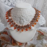 Collier Ambre avec des cristaux de Swarovski : perles nacr&eacute;es/toupies, gouttes en verre et rocailles. Aux couleurs Topaze, Travertin, Copper et Gold pour une transparence aux reflets ambr&eacute;s.